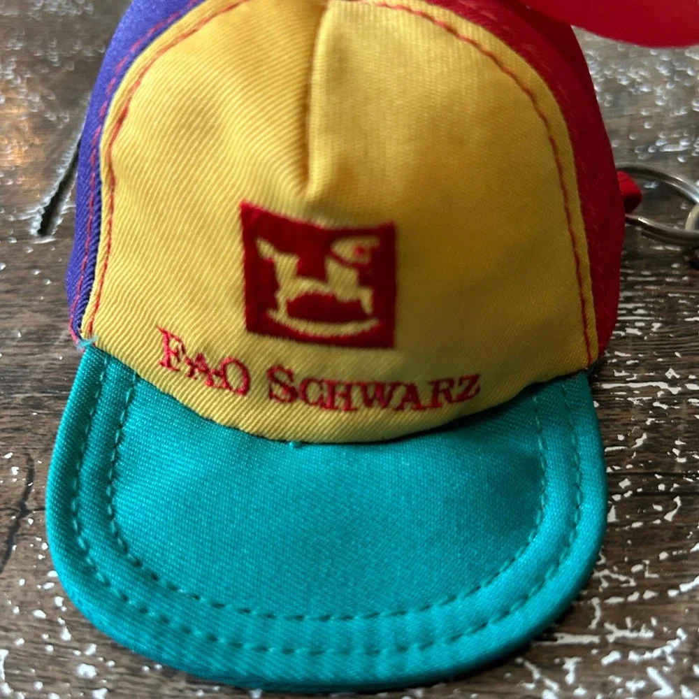 FAO Schwarz Vintage Propeller Hat Keychain Coin Purse Multicolor Retro Toy Logo